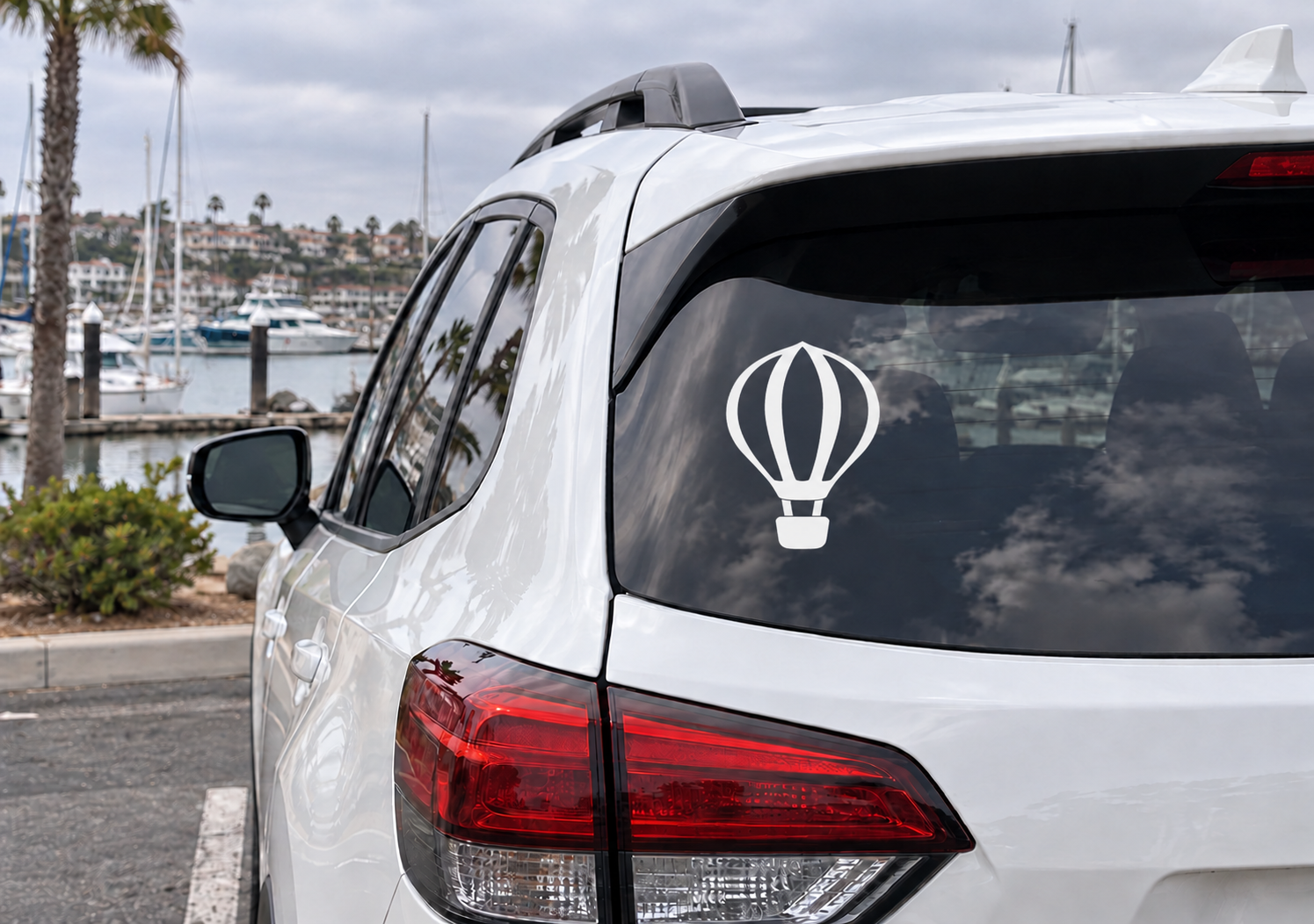 Hot air balloon vinyl car decal on rear window, black and white balloon icon