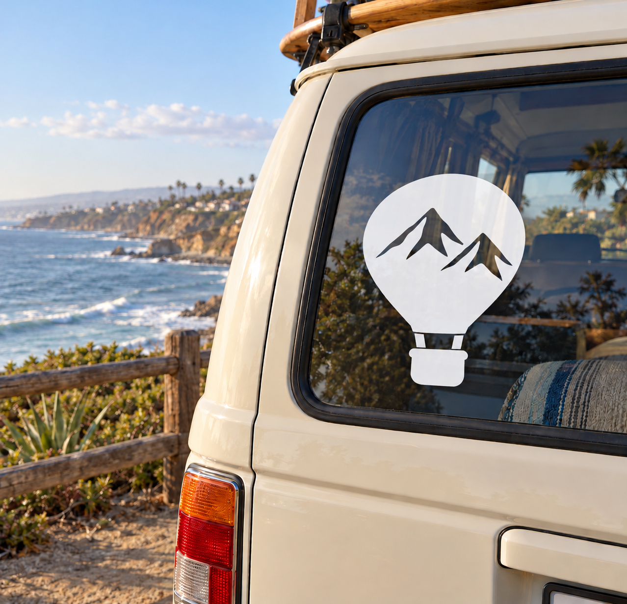 Hot air balloon window vinyl decal with black mountain silhouette inside a white circle
