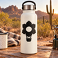 Black sunflower hot air balloon vinyl decal on a white bottle