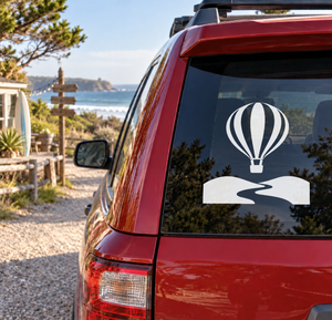 Hot air balloon vinyl decal: black-and-white balloon over rolling hills