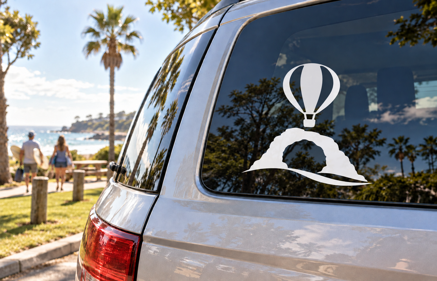Hot air balloon vinyl decal with desert arch on car window