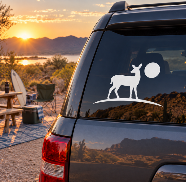Vinyl decal of black doe silhouette with moon for vehicle windows