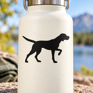 Vinyl decal of black hunting pointer dog silhouette on light surface.