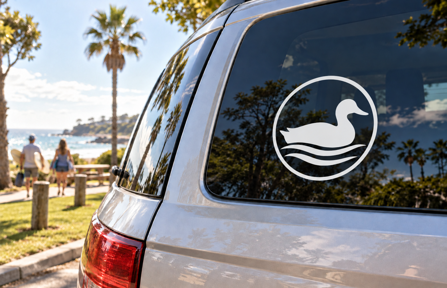Round hunting marsh vinyl decal with black duck silhouette and white wave lines
