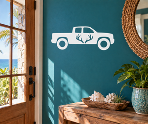 Hunting pickup truck vinyl decal with antler silhouette, white on dark surface