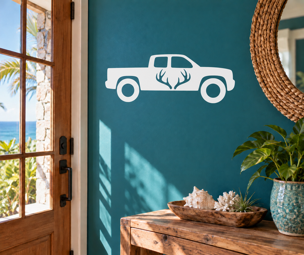 Hunting pickup truck vinyl decal with antler silhouette, white on dark surface