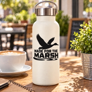 Black vinyl decal with flying bird silhouette and “MADE FOR THE MARSH” lettering on bottle