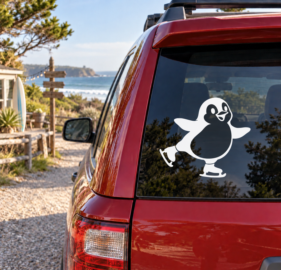Ice skating penguin vinyl decal on car window, white and black penguin figure