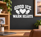 White vinyl decal with “GOOD ICE WARM HEARTS” text and heart with hand icons
