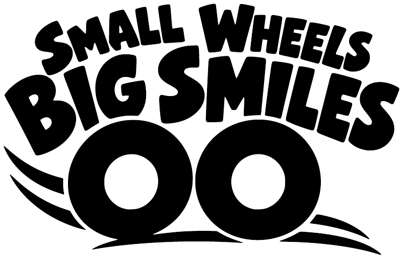 Vinyl skating decal reading “SMALL WHEELS BIG SMILES” with two large wheel icons
