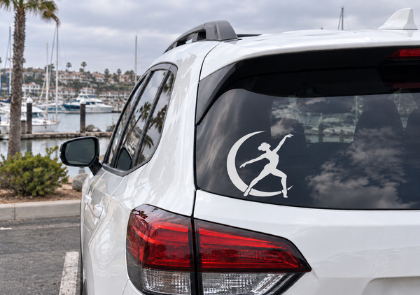 Car window vinyl decal with black jazz dancer silhouette on moon