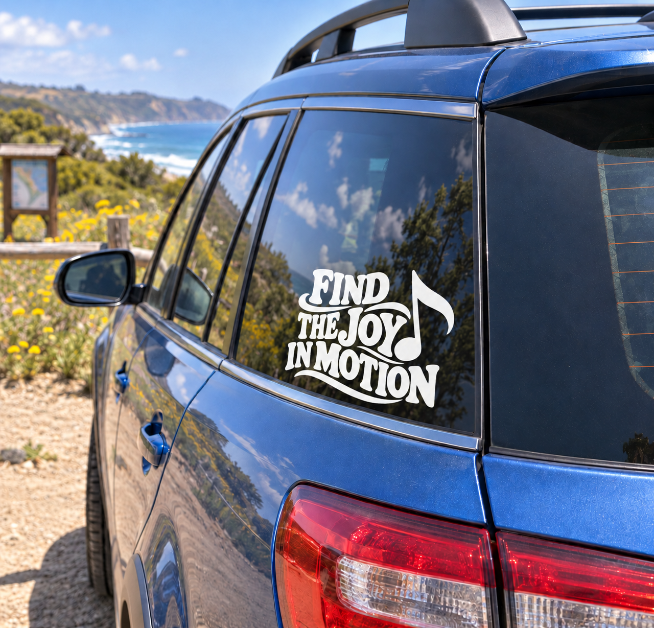 Find the joy in motion vinyl decal on car rear window, black and white