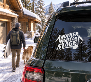Black vinyl decal with “Another Night On Stage” text on a car rear window