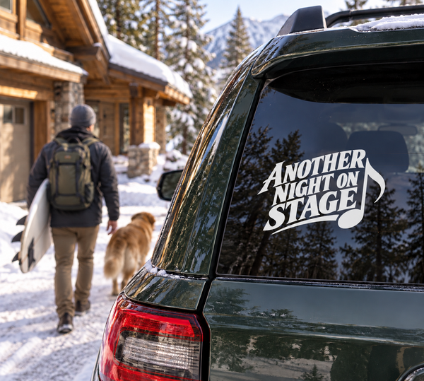 Black vinyl decal with “Another Night On Stage” text on a car rear window