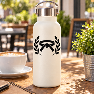 Karate vinyl decal with laurel wreath and black belt symbol on a white water bottle