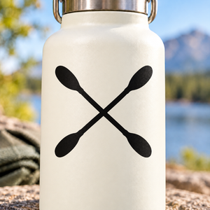 Crossed kayak paddles vinyl decal on white bottle