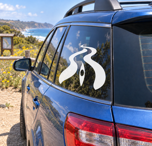 Kayak river-bend vinyl decal, white-and-black flame graphic on car window