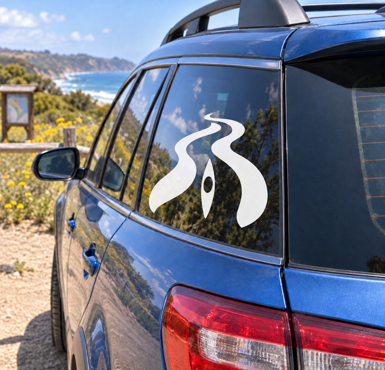 Kayak river-bend vinyl decal, white-and-black flame graphic on car window