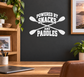 Vinyl decal with white text “Powered by Snacks and Paddles” and crossed paddle icons