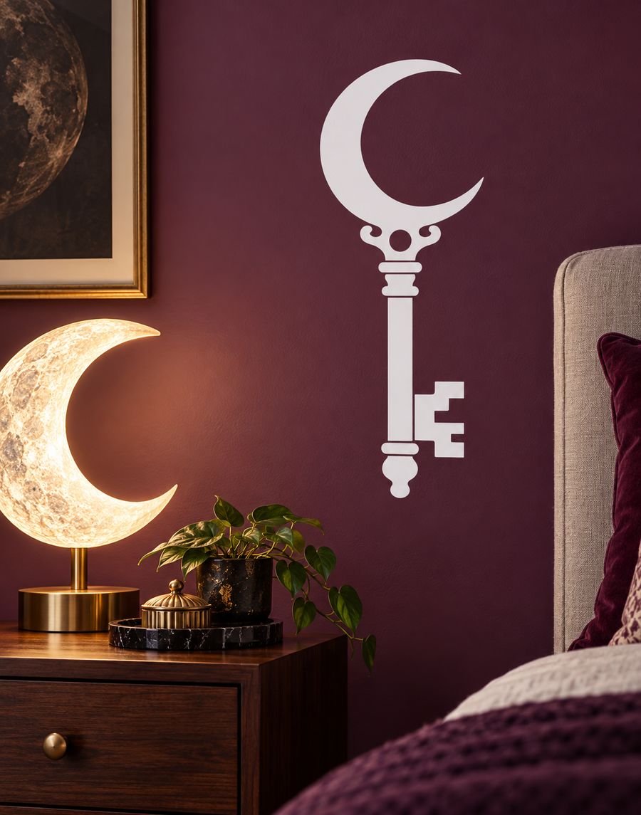 White crescent moon and ornate key vinyl wall decal with cross-shaped accents