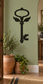 Botanical key vinyl decal with black winged key silhouette