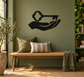 Black vinyl decal silhouette of hand holding key with clover shapes