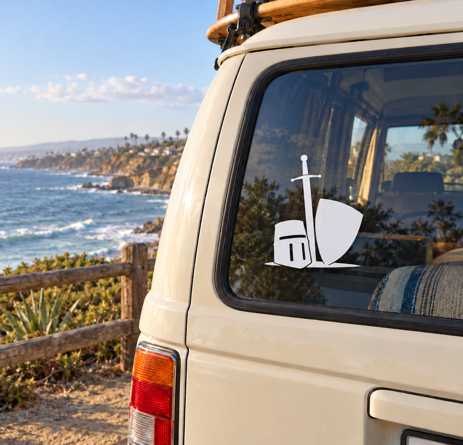 Vinyl decal of white knight helmet with vertical sword on car window