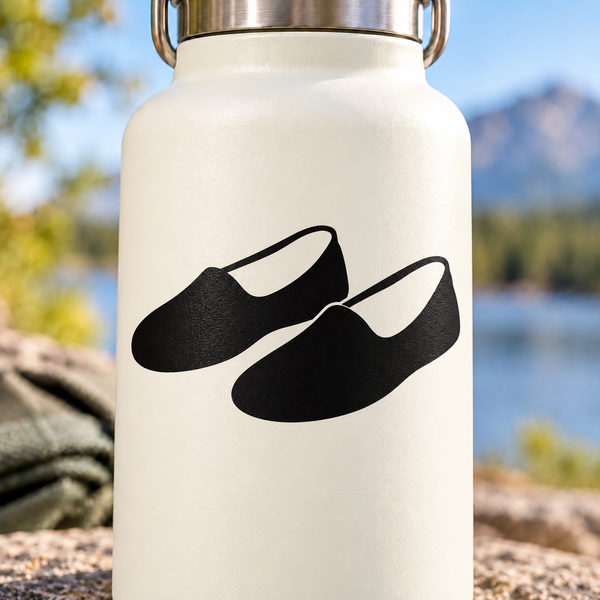 Vinyl decal pair of two black kung fu training shoe icons on white surface
