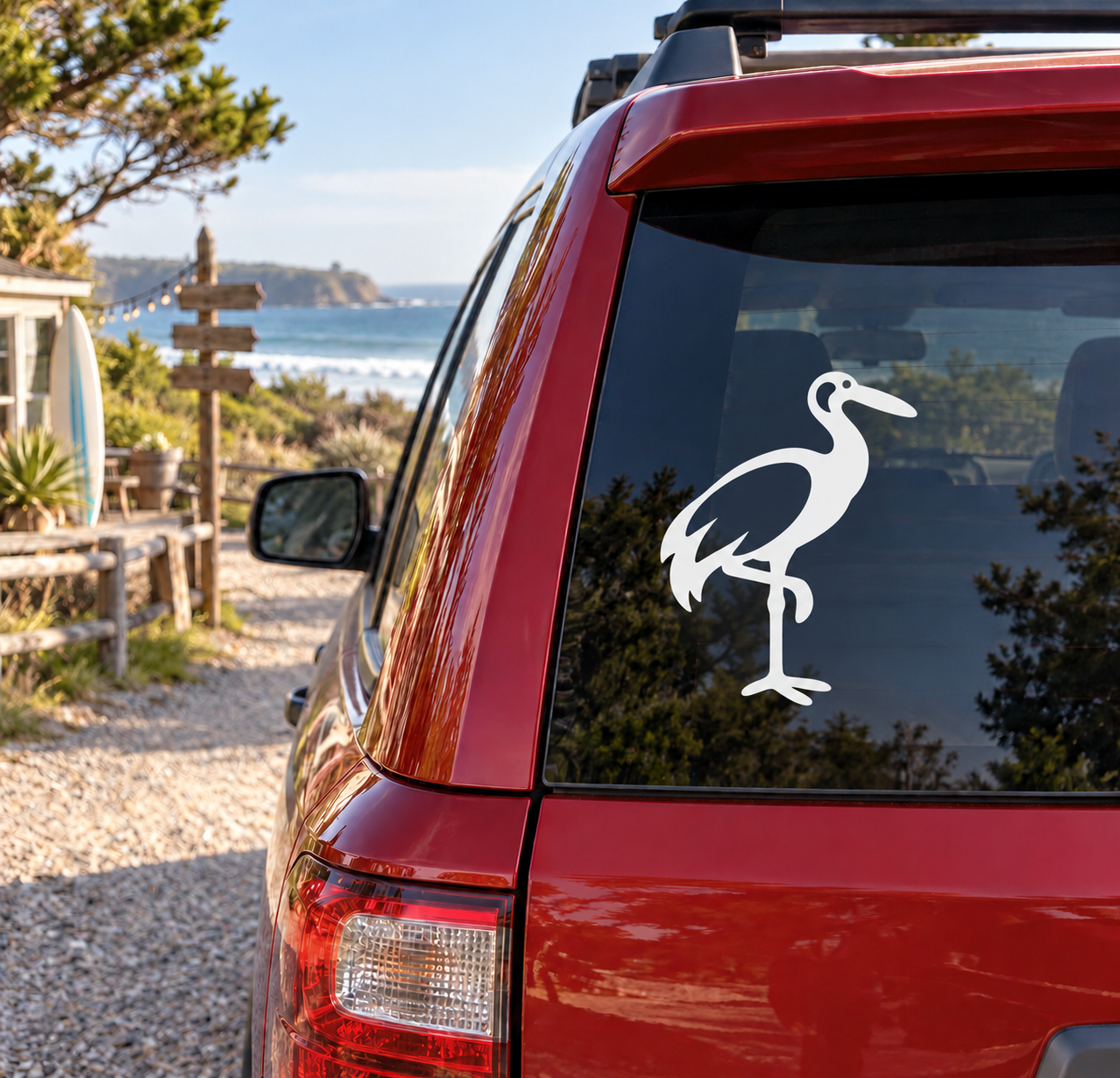 White crane balance emblem vinyl decal on car rear window