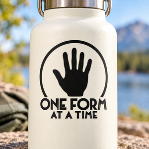 Vinyl wall decal with black hand icon and 'ONE FORM AT A TIME' text