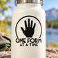 Vinyl wall decal with black hand icon and 'ONE FORM AT A TIME' text