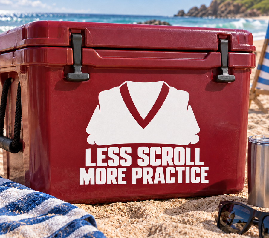 Vinyl decal on red cooler with white kung fu shirt icon and 'Less Scroll More Practice'