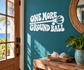 Lacrosse vinyl decal: white 'ONE MORE GROUND BALL' lettering with winged ball icon