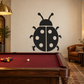 Black ladybug vinyl decal with white dot spots, mirrored split wings, small sparkle details