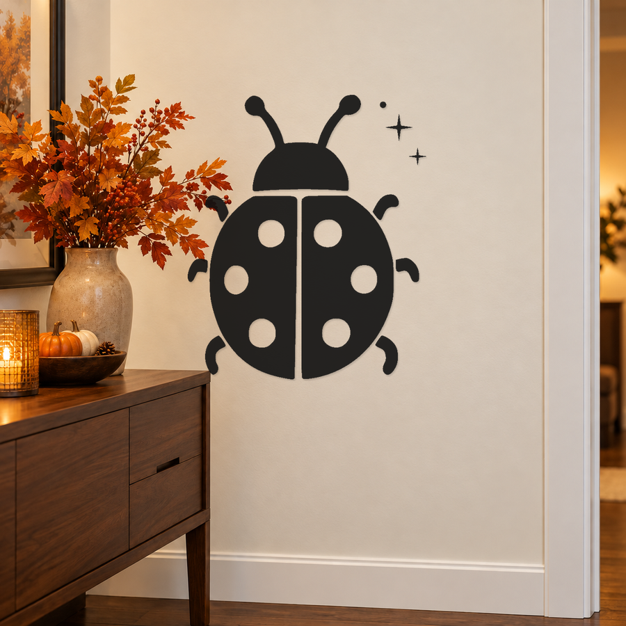Black ladybug wall decal with six white round spots and small sparkle stars