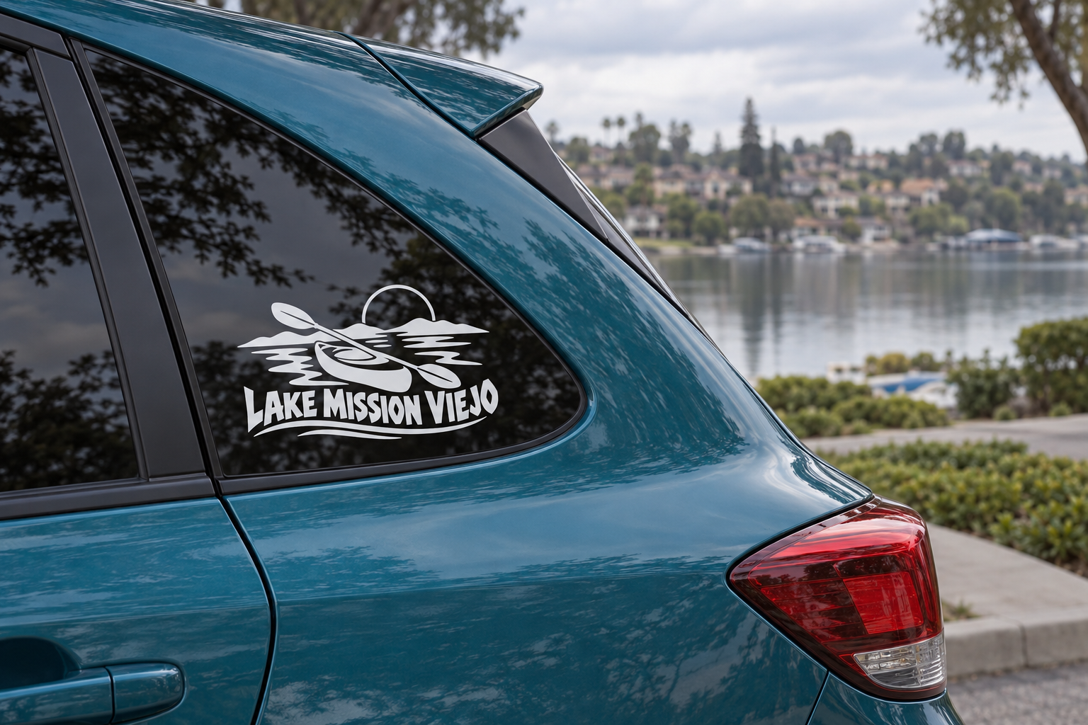 Kayak vinyl wordmark decal for Lake Mission Viejo, white logo on teal boat.