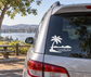 Black palm tree and waves vinyl decal on car rear window