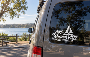 Lake Mission Viejo vinyl decal with sailboat and cursive lettering on car window