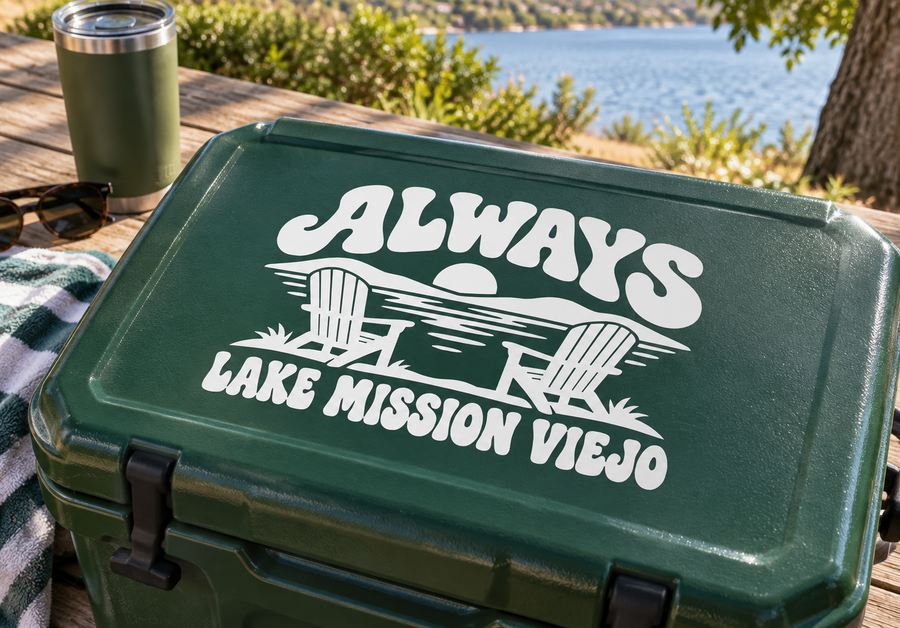 White vinyl decal reading ALWAYS and LAKE MISSION VIEJO on dark surface