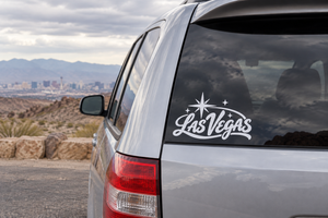 Las Vegas wordmark vinyl decal with starburst on car rear window