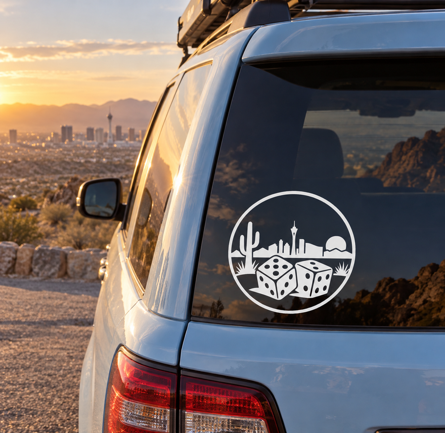 Vinyl car decal featuring a black lucky dice crest on a vehicle rear window