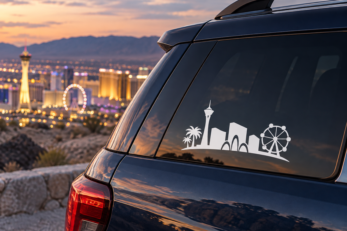Vinyl car window decal showing white skyline icons, palm tree, and ferris wheel