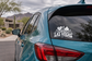 Las Vegas vinyl decal with skyline and card-suit emblem on car rear panel