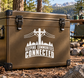 White vinyl decal with pine trees, central cross, and curved "Keeping Communities Connected" text