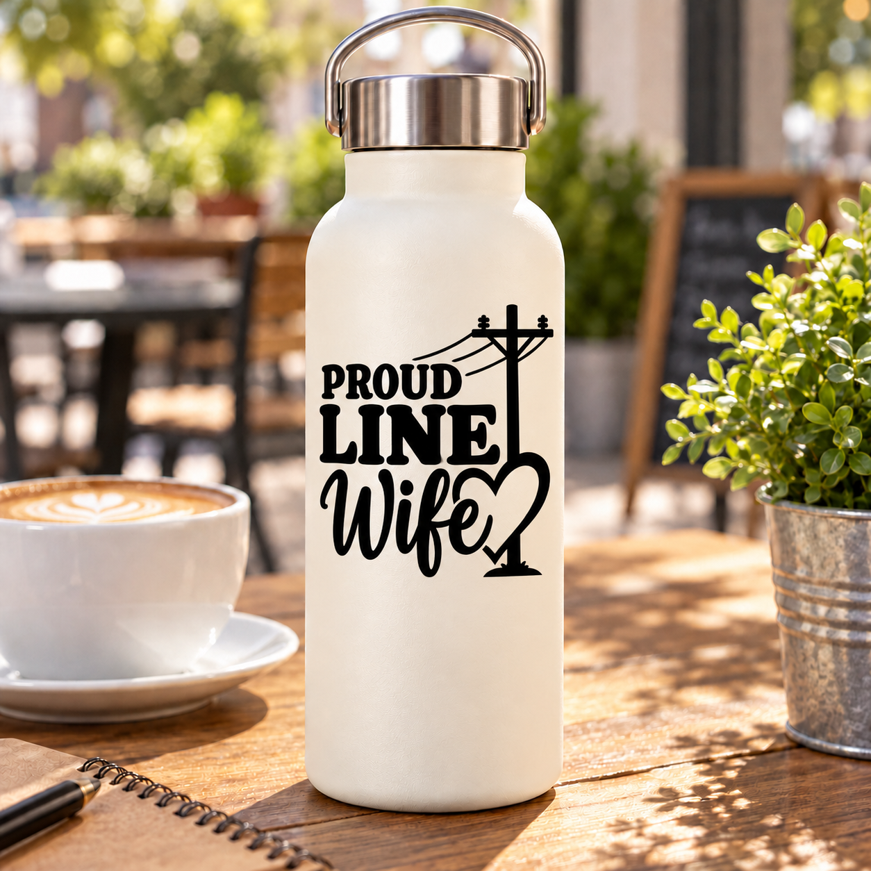Vinyl decal reading "PROUD LINE Wife" with power pole and heart on light bottle