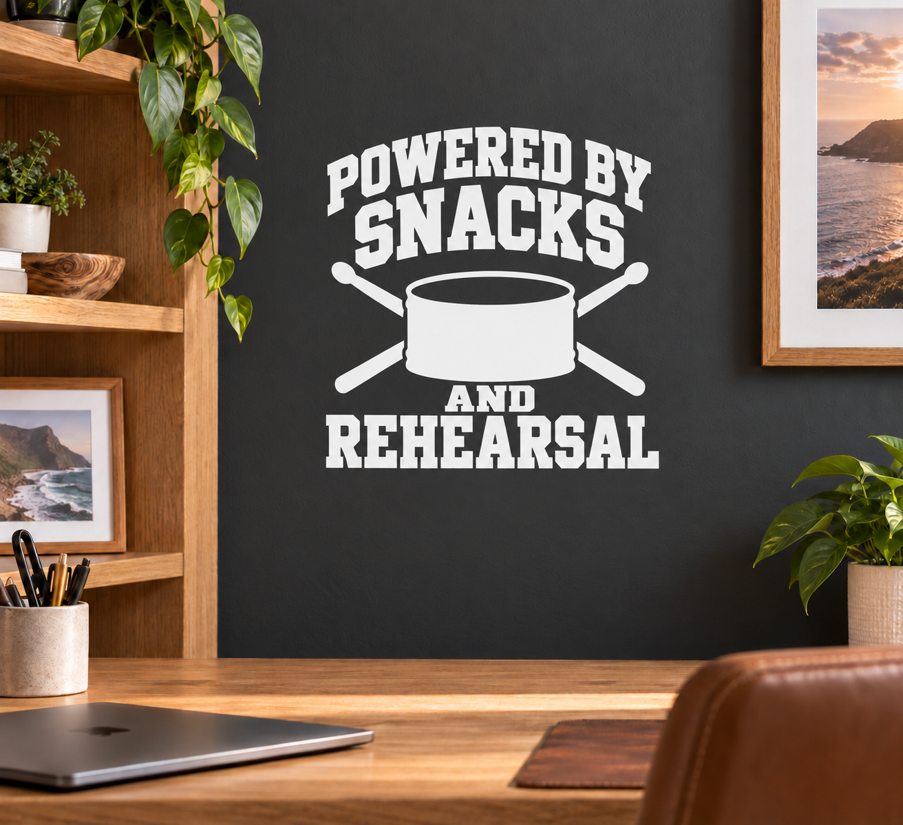 Vinyl wall decal: white 'Powered by Snacks and Rehearsal' text with pot icon