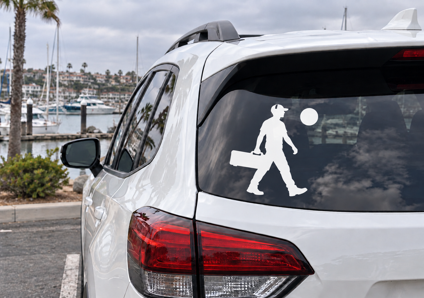 MarksmenCX001 vinyl decal: walking figure silhouette on car rear window, white
