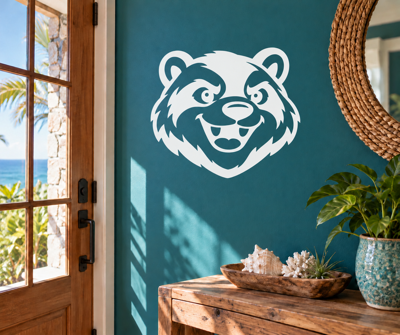 Mascot animal face vinyl decal, white and dark outline on teal background