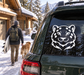 Snow leopard face vinyl decal on dark car window