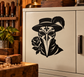 Plague doctor mask vinyl decal with black hat and rose, applied on cabinet door